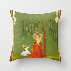 A female attendant is standing in tribhanga pose under a tree. A small child vies for her attention. Throw Pillow