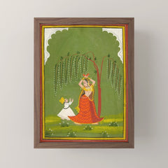 A female attendant is standing in tribhanga pose under a tree. A small child vies for her attention. Mini Art Print