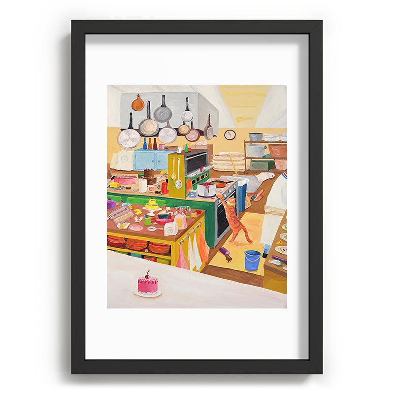 A Cat in the Kitchen Framed Art Print