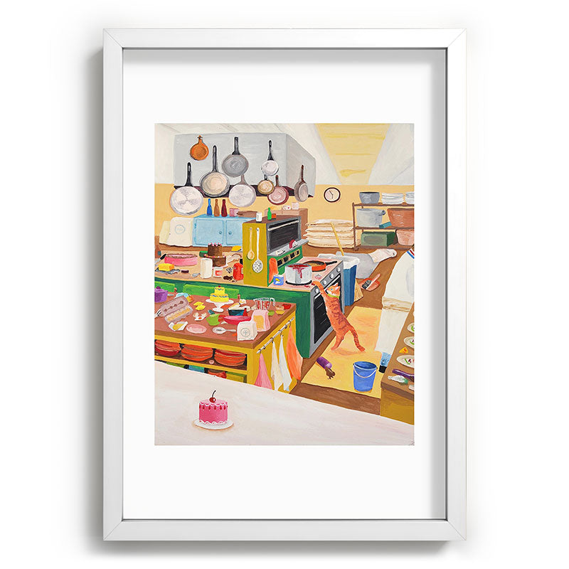 A Cat in the Kitchen Framed Art Print