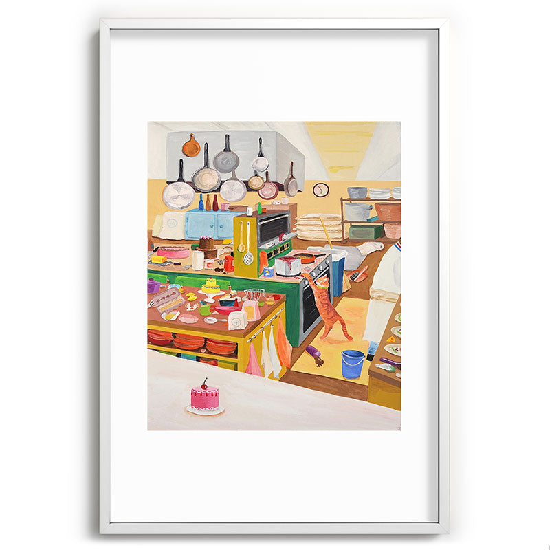 A Cat in the Kitchen Framed Art Print