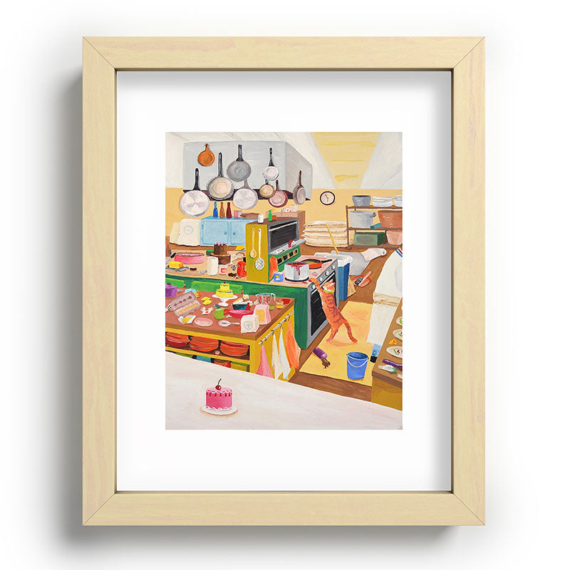 A Cat in the Kitchen Framed Art Print