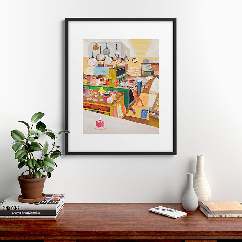 A Cat in the Kitchen Framed Art Print