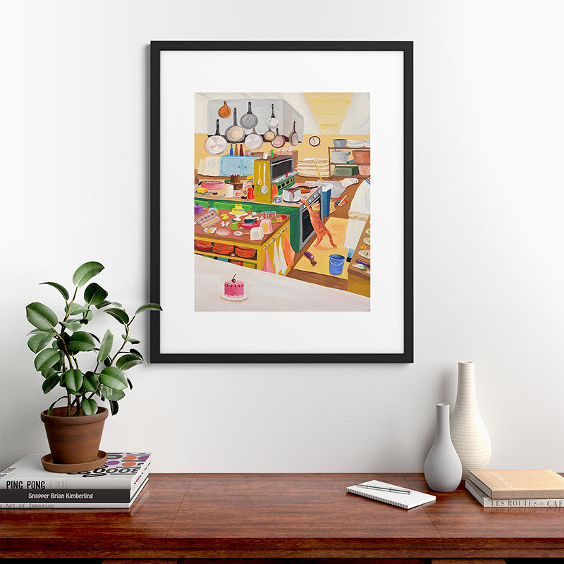 A Cat in the Kitchen Framed Art Print