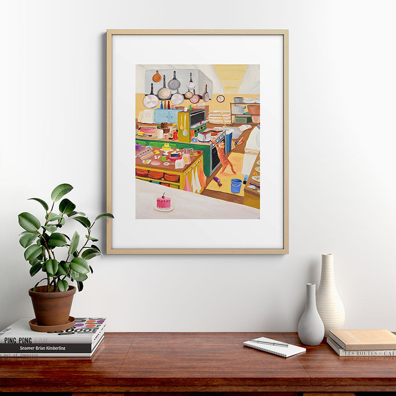 A Cat in the Kitchen Framed Art Print