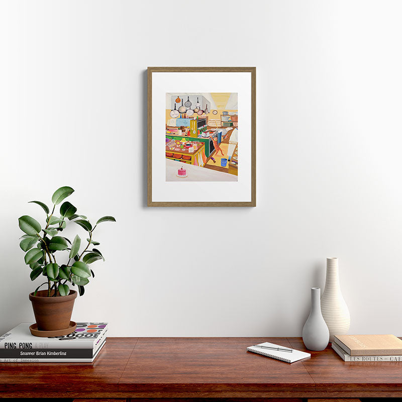 A Cat in the Kitchen Framed Art Print