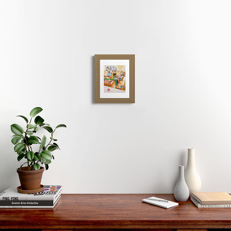 A Cat in the Kitchen Framed Art Print