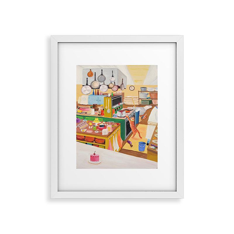 A Cat in the Kitchen Framed Art Print