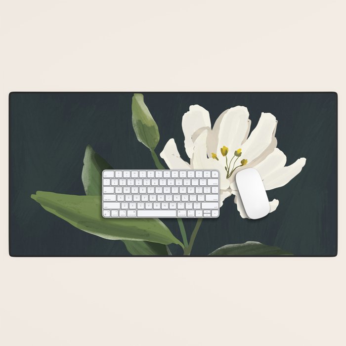 A flower in a vase Desk Mat