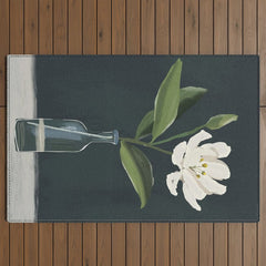 A flower in a vase Outdoor Rug