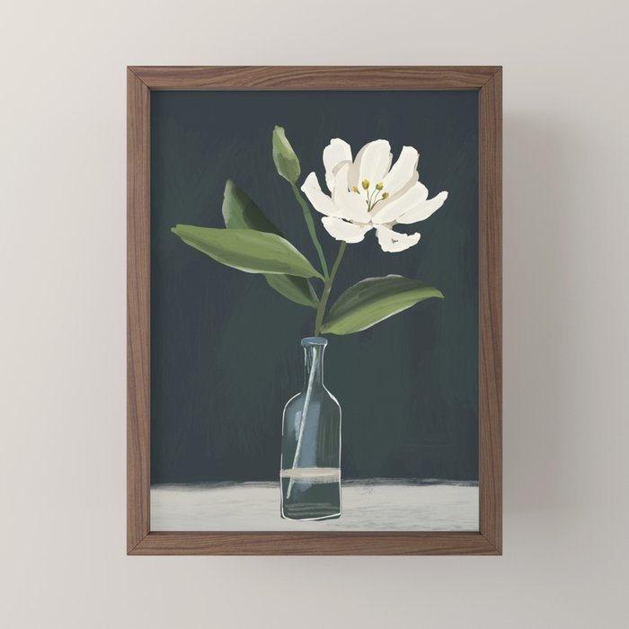 A flower in a vase Mini Art Print