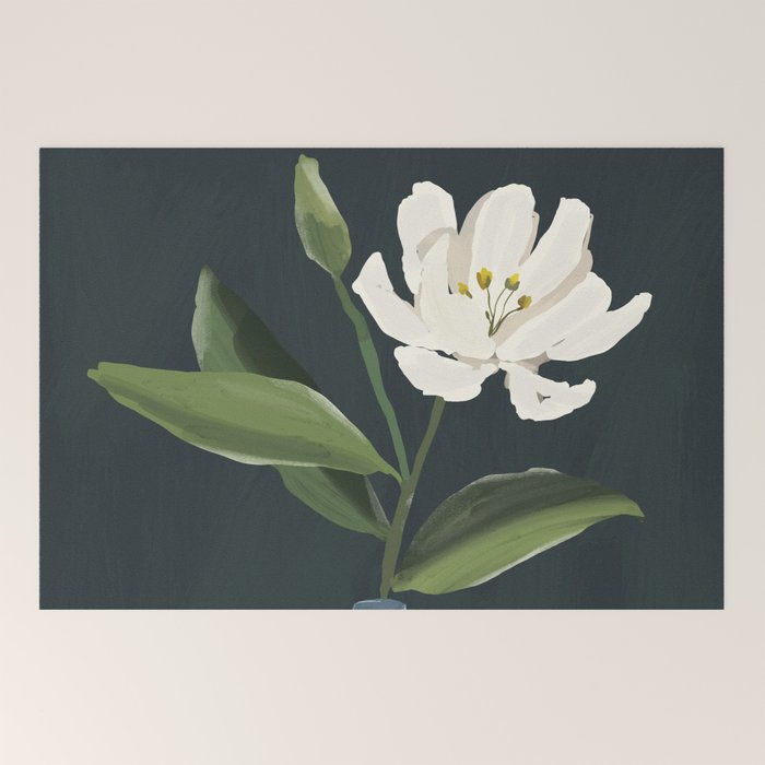 A flower in a vase Welcome Mat