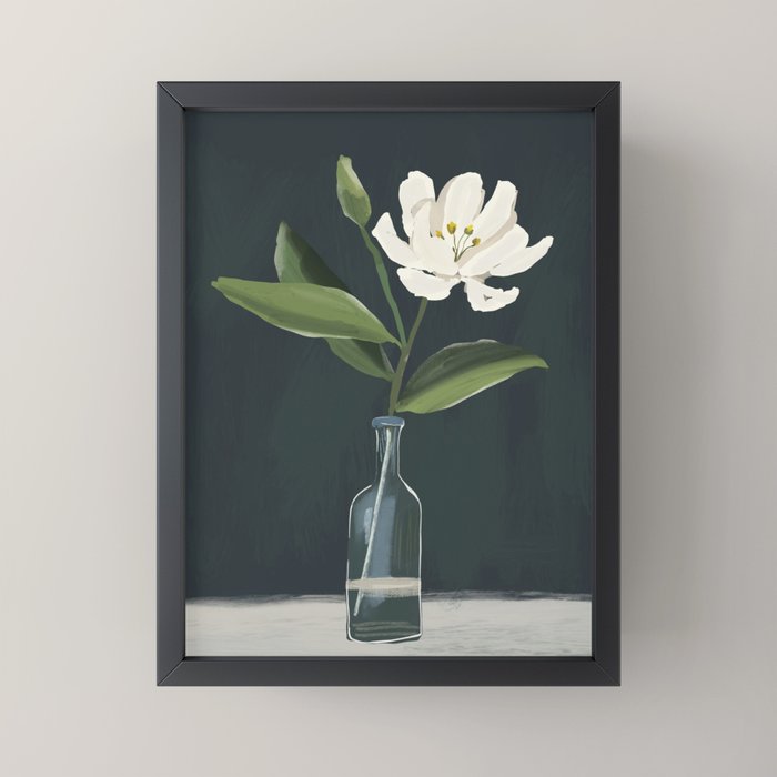 A flower in a vase Mini Art Print
