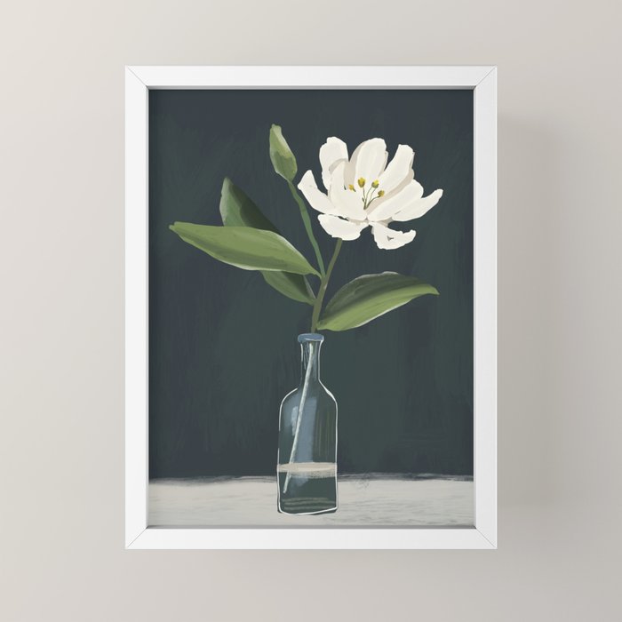 A flower in a vase Mini Art Print