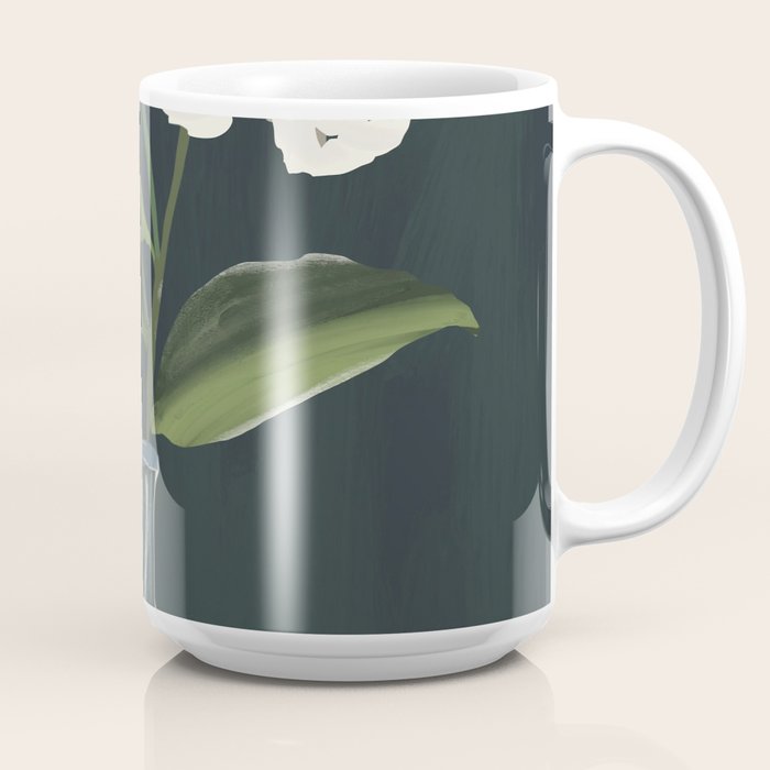 A flower in a vase Coffee Mug