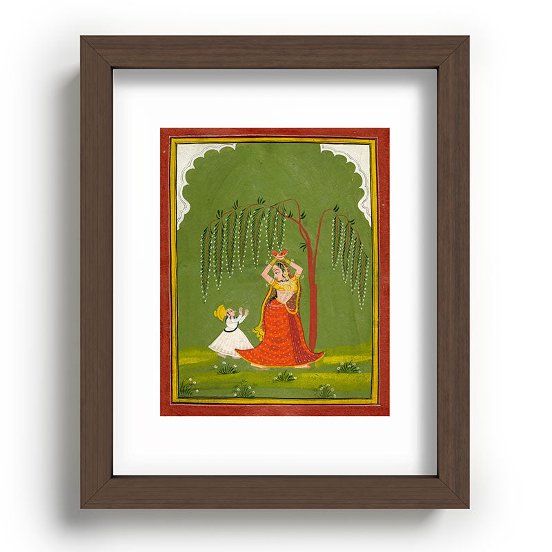 A female attendant is standing in tribhanga pose under a tree. A small child vies for her attention. Framed Art Print