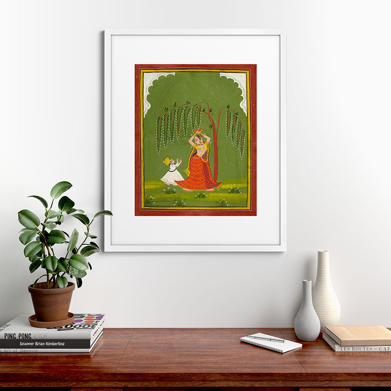 A female attendant is standing in tribhanga pose under a tree. A small child vies for her attention. Framed Art Print