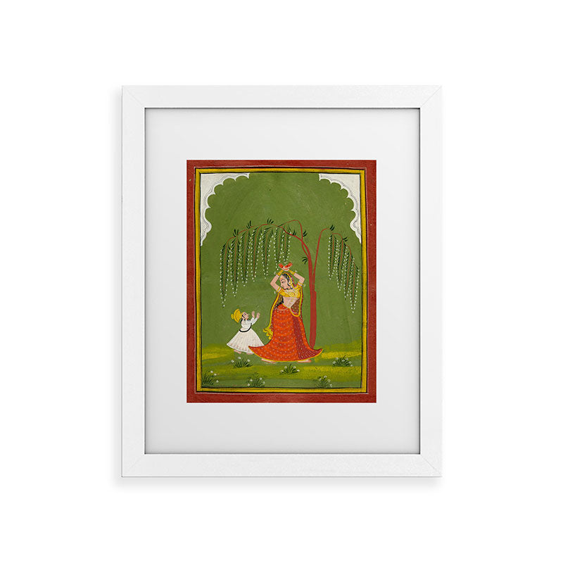 A female attendant is standing in tribhanga pose under a tree. A small child vies for her attention. Framed Art Print