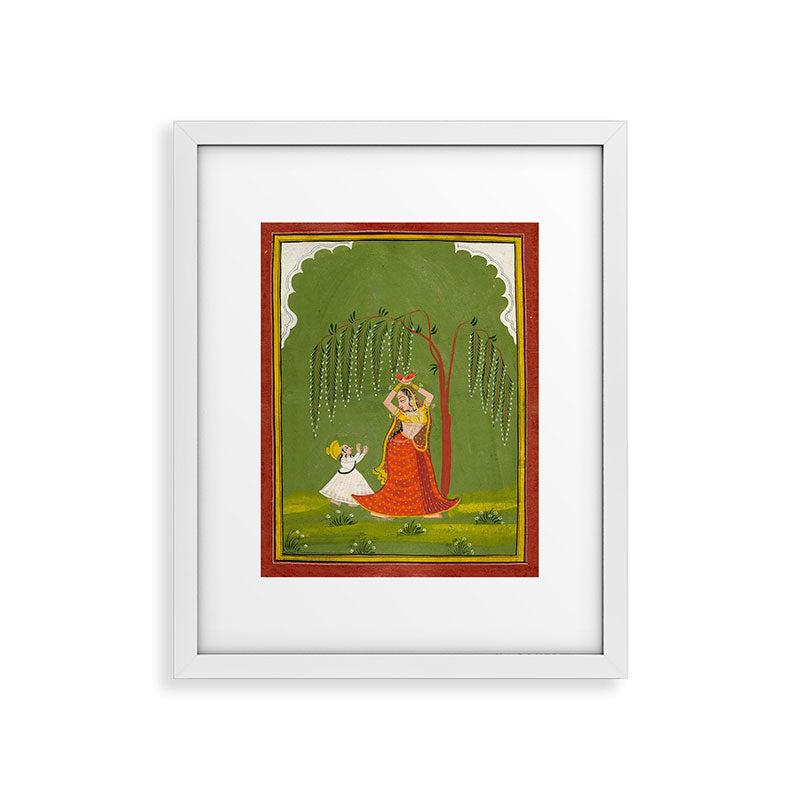 A female attendant is standing in tribhanga pose under a tree. A small child vies for her attention. Framed Art Print