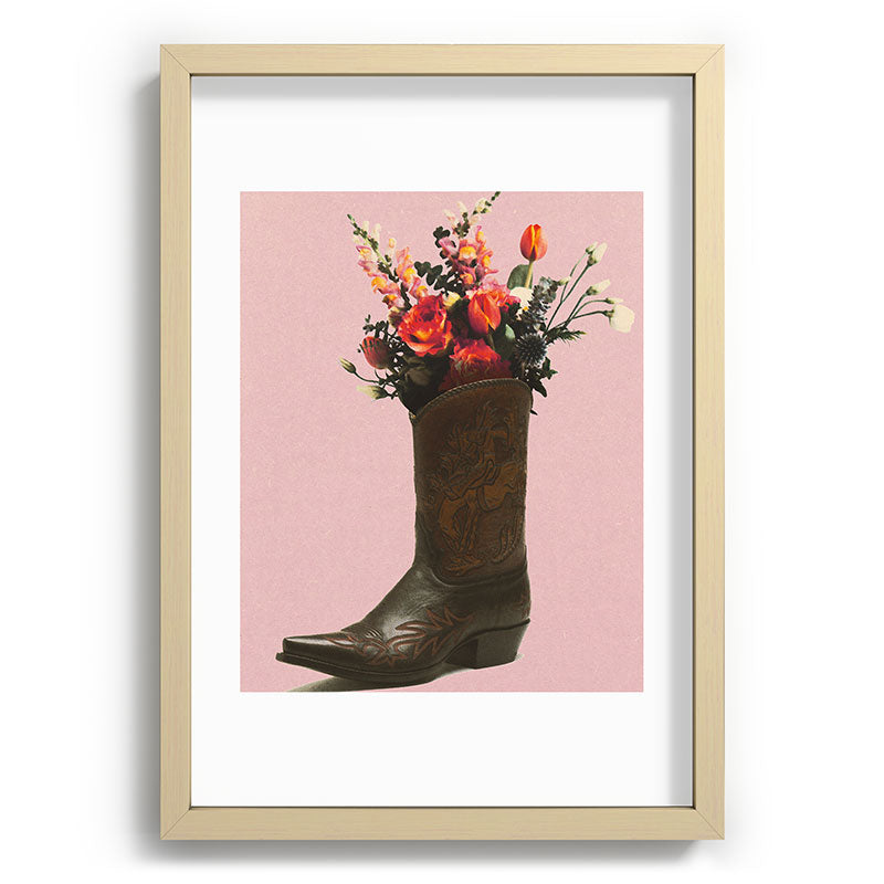 A Cowboy Boot With Spring Bouquet Framed Art Print
