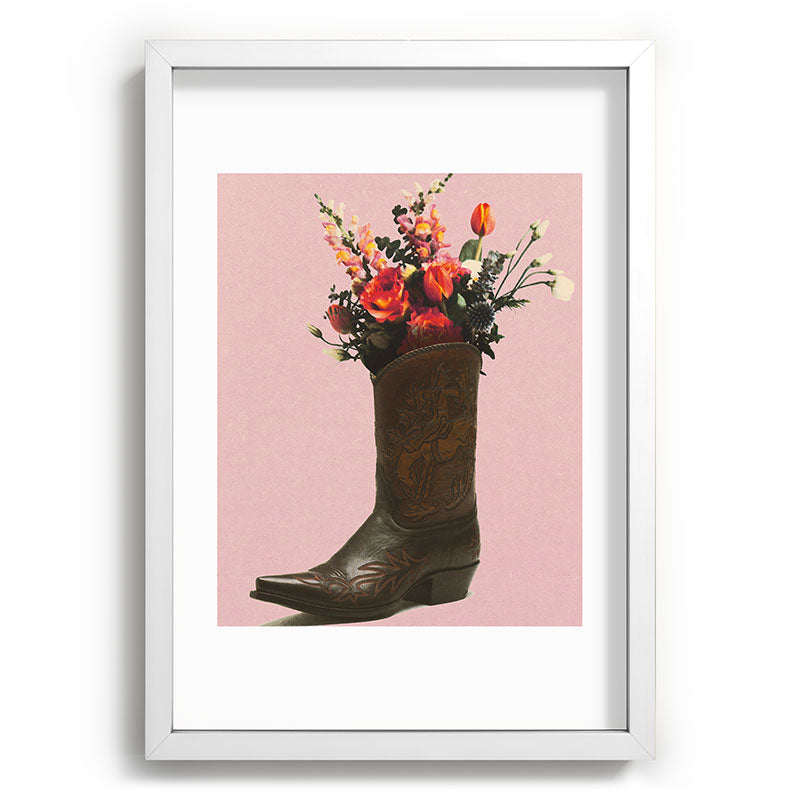 A Cowboy Boot With Spring Bouquet Framed Art Print