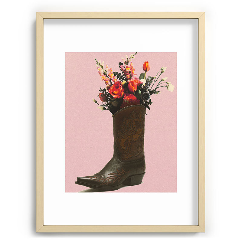 A Cowboy Boot With Spring Bouquet Framed Art Print