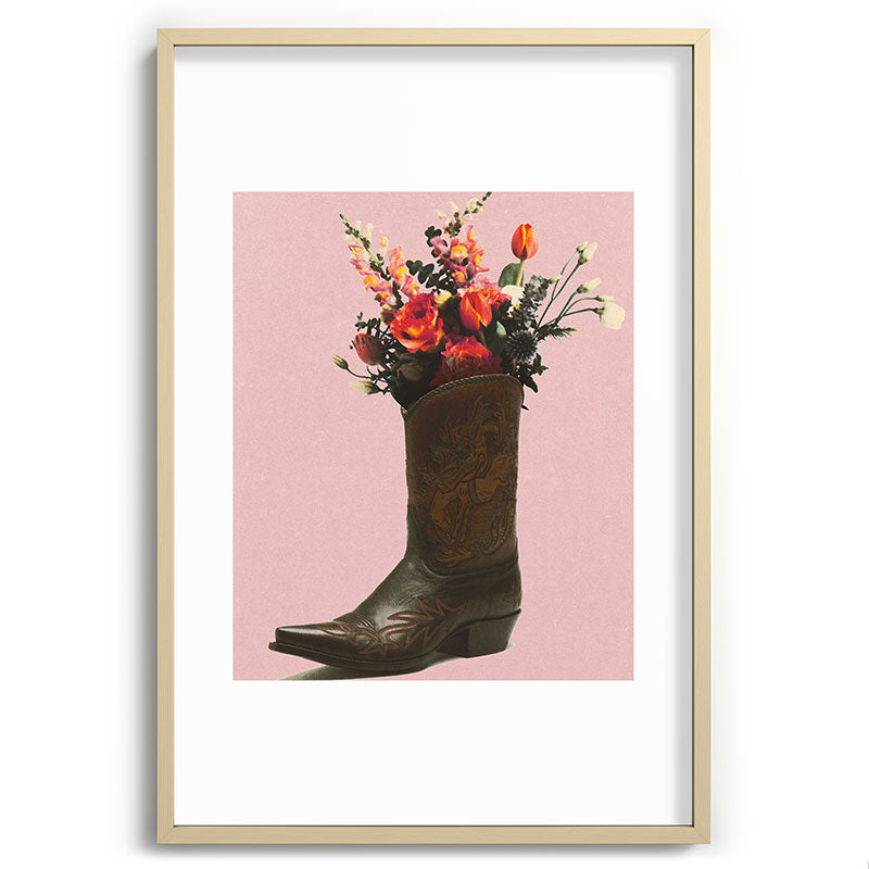 A Cowboy Boot With Spring Bouquet Framed Art Print