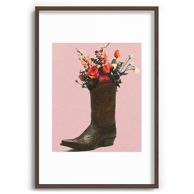 A Cowboy Boot With Spring Bouquet Framed Art Print