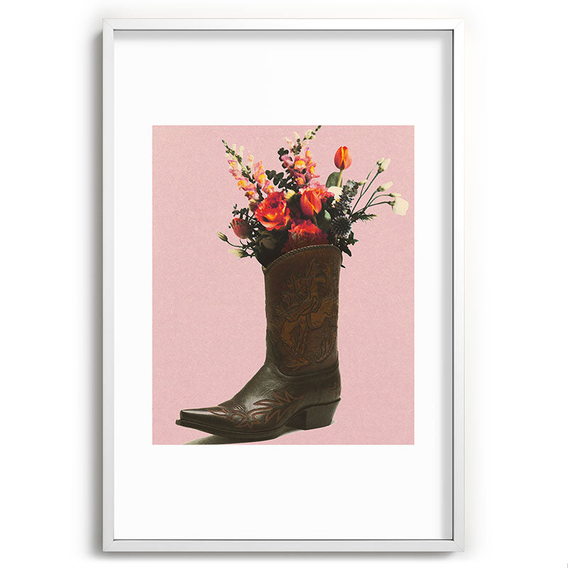 A Cowboy Boot With Spring Bouquet Framed Art Print