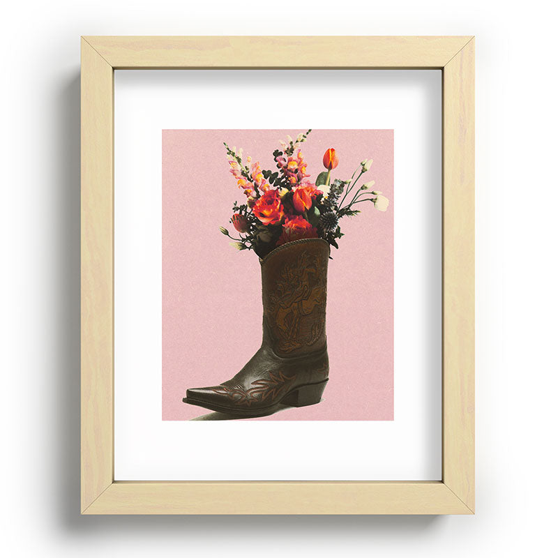 A Cowboy Boot With Spring Bouquet Framed Art Print