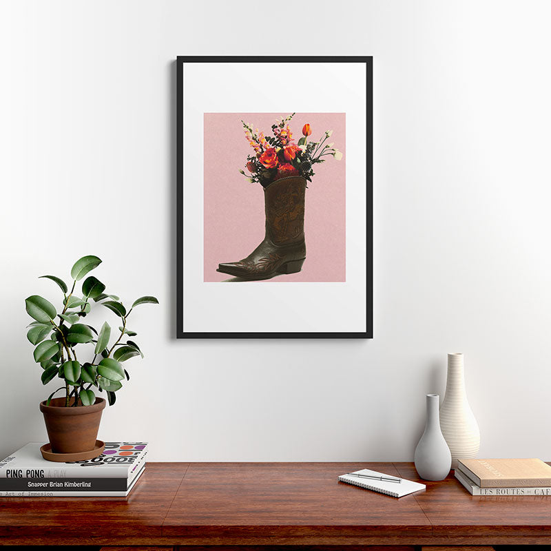 A Cowboy Boot With Spring Bouquet Framed Art Print