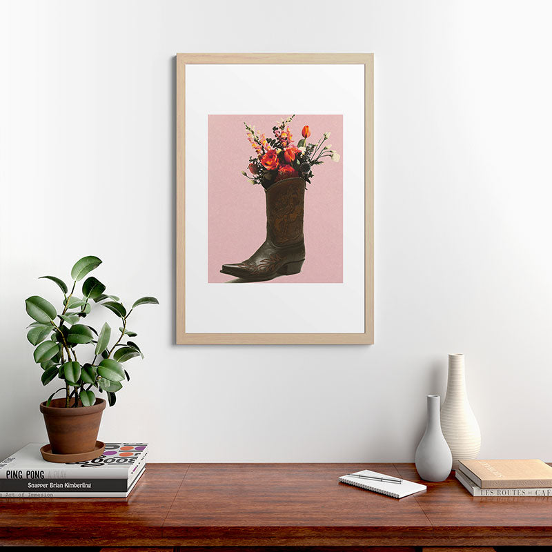 A Cowboy Boot With Spring Bouquet Framed Art Print