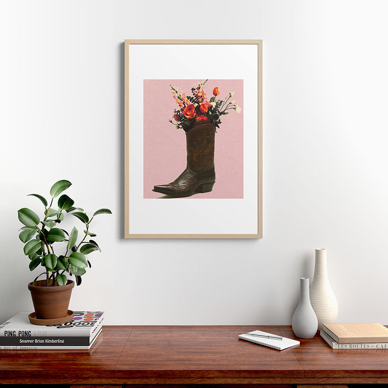 A Cowboy Boot With Spring Bouquet Framed Art Print