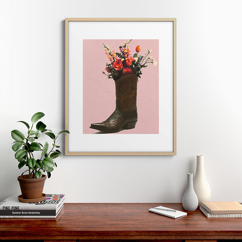 A Cowboy Boot With Spring Bouquet Framed Art Print