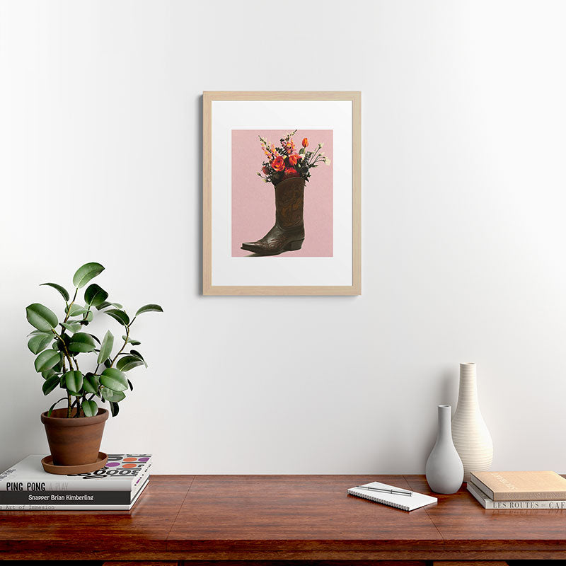 A Cowboy Boot With Spring Bouquet Framed Art Print