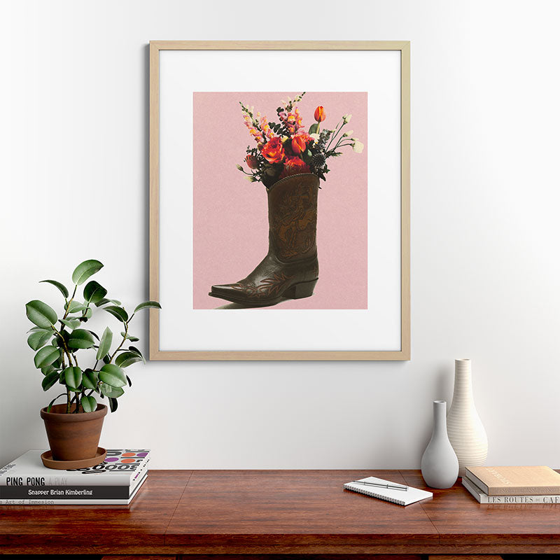 A Cowboy Boot With Spring Bouquet Framed Art Print