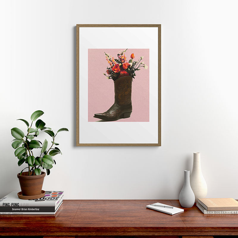 A Cowboy Boot With Spring Bouquet Framed Art Print