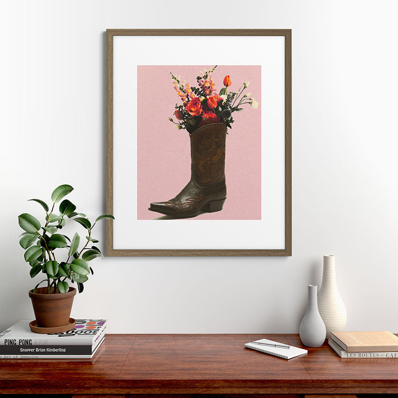 A Cowboy Boot With Spring Bouquet Framed Art Print