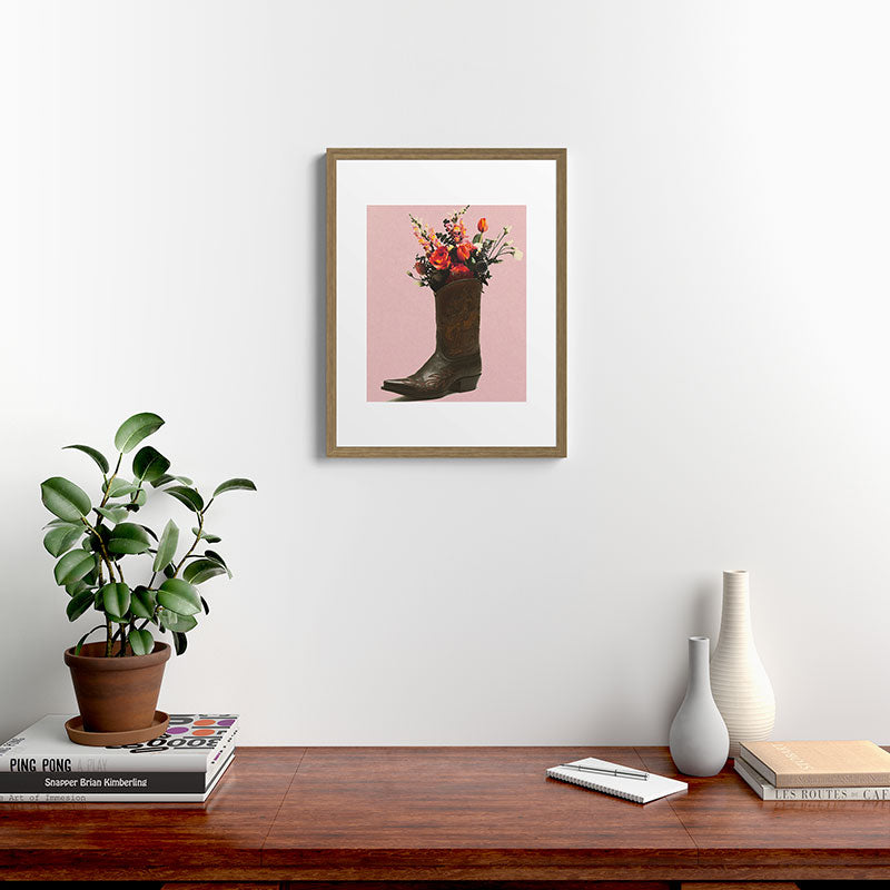 A Cowboy Boot With Spring Bouquet Framed Art Print