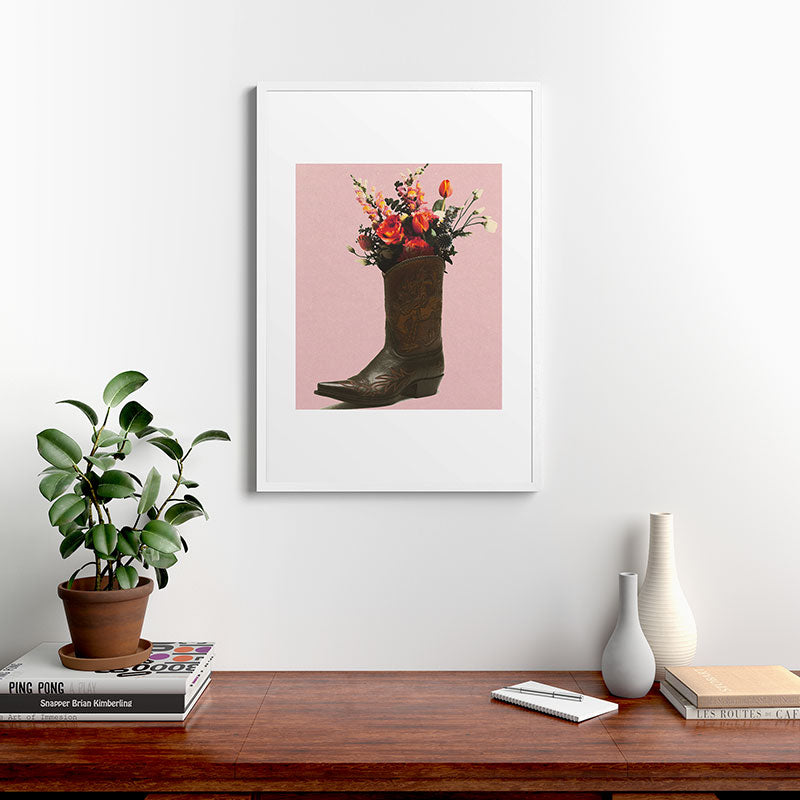 A Cowboy Boot With Spring Bouquet Framed Art Print