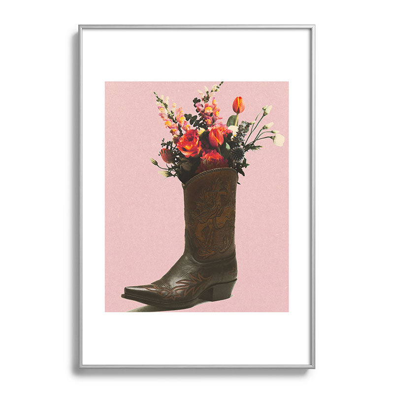 A Cowboy Boot With Spring Bouquet Framed Art Print