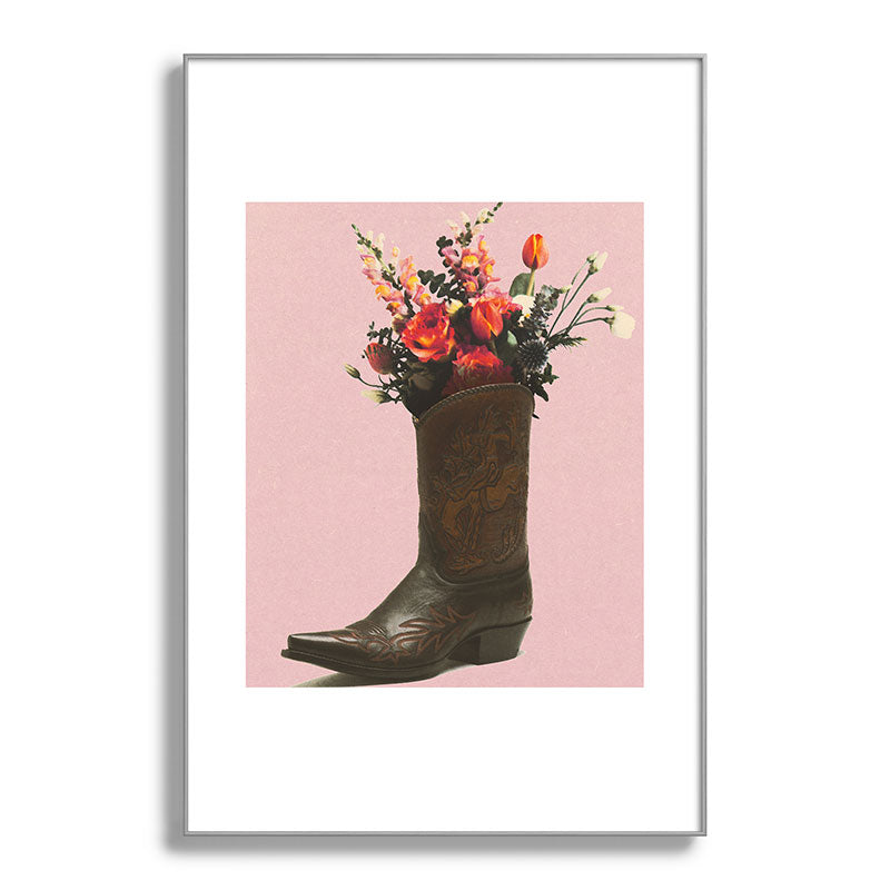 A Cowboy Boot With Spring Bouquet Framed Art Print