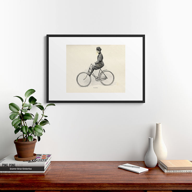 "Coasting" from "Bicycling for Ladies" by Maria E. Ward, 1896 Framed Art Print