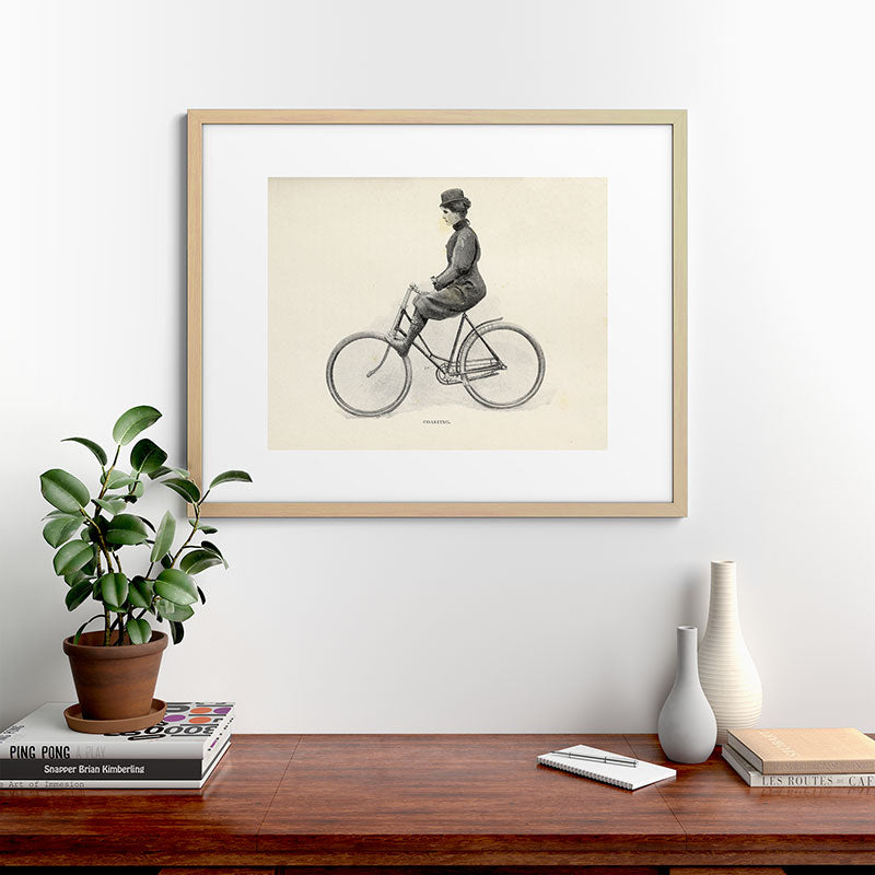 "Coasting" from "Bicycling for Ladies" by Maria E. Ward, 1896 Framed Art Print