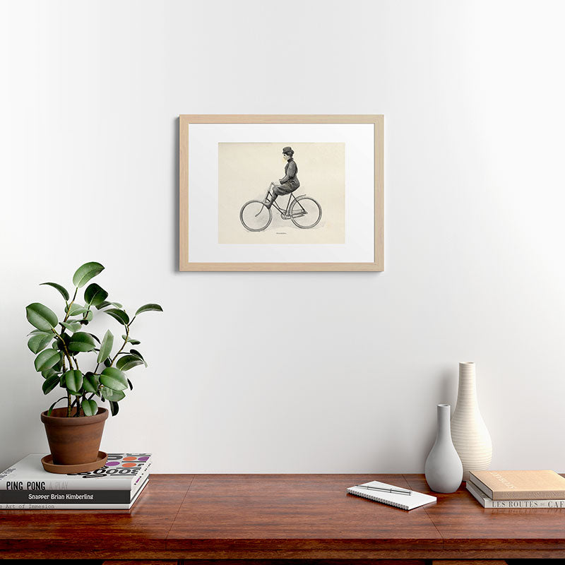 "Coasting" from "Bicycling for Ladies" by Maria E. Ward, 1896 Framed Art Print