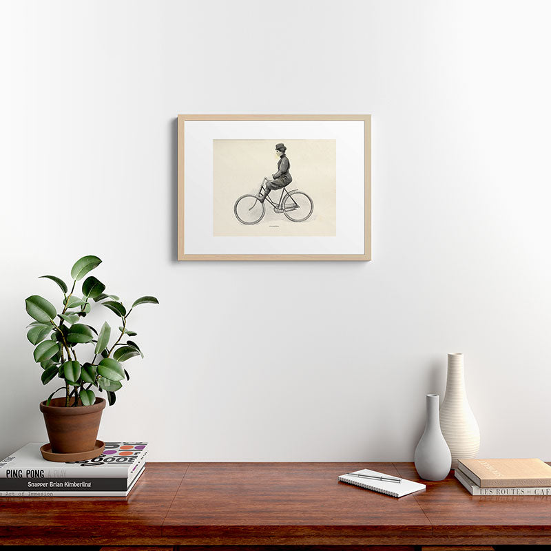 "Coasting" from "Bicycling for Ladies" by Maria E. Ward, 1896 Framed Art Print