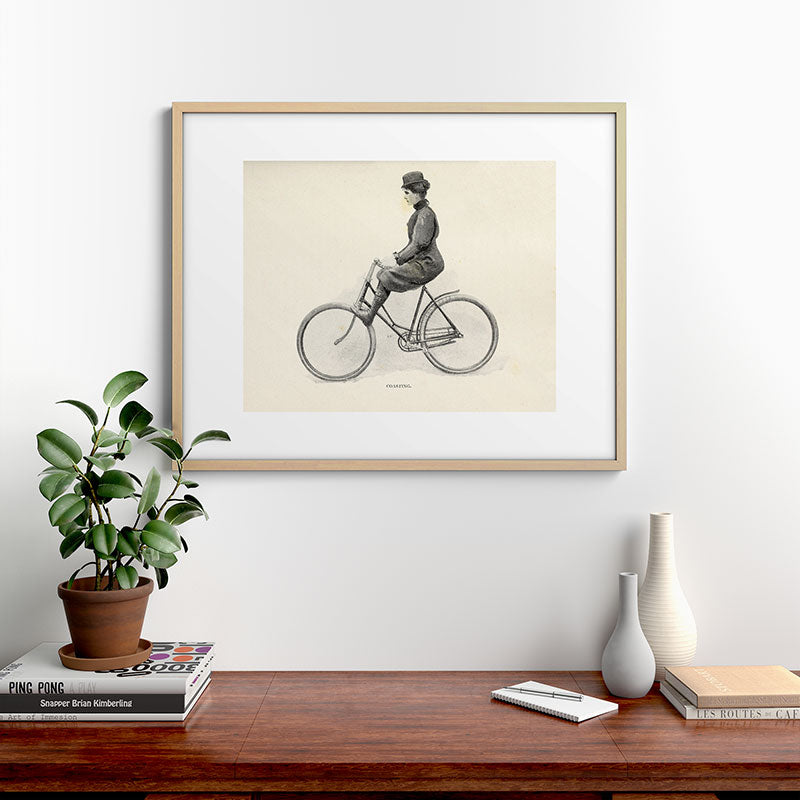 "Coasting" from "Bicycling for Ladies" by Maria E. Ward, 1896 Framed Art Print