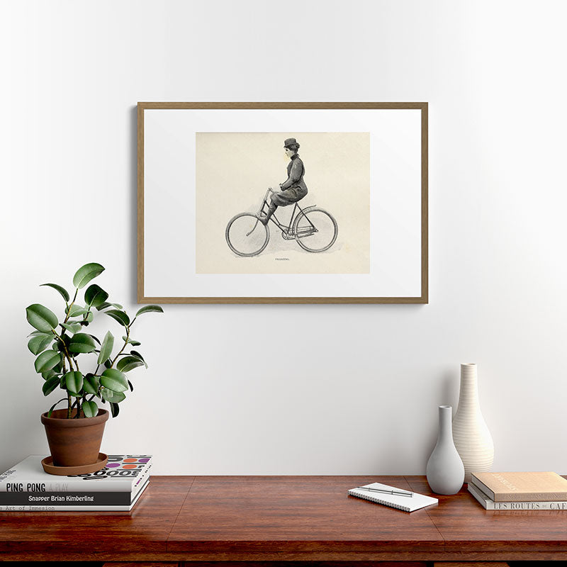 "Coasting" from "Bicycling for Ladies" by Maria E. Ward, 1896 Framed Art Print