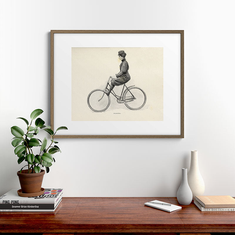 "Coasting" from "Bicycling for Ladies" by Maria E. Ward, 1896 Framed Art Print