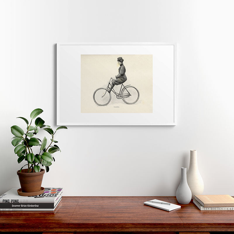 "Coasting" from "Bicycling for Ladies" by Maria E. Ward, 1896 Framed Art Print